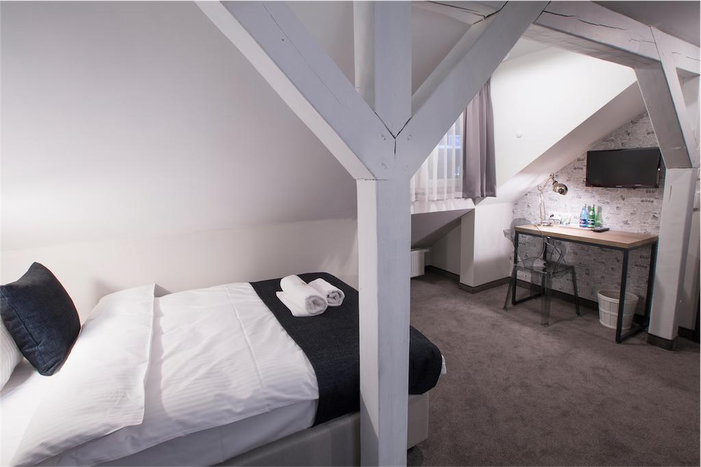 לינה וארוחת בוקר ורשה Marcopolo House חדר תמונה